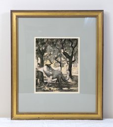 A Man Reading In A Garden