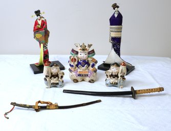 Japanese Dolls, Ceramic Figures And Two Katana's