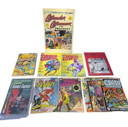 Collection Of Vintage Comic Books And A Decorative Sign Featuring Wonder Woman