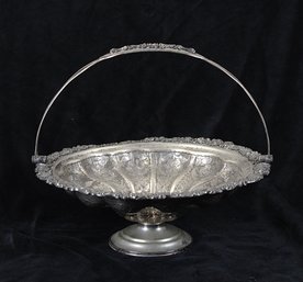 Victorian Silverplate Footed Brides Basket With Swing Handle