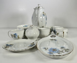 Vintage Porcelain Tea Set With Blue Floral Design