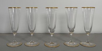 Set Of Five Gold-Rimmed Champagne Flutes