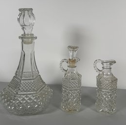 Set Of Three Diamond Pattern Glass Decanters