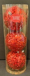 Three Vibrant And Sparkly Large Red Ornaments