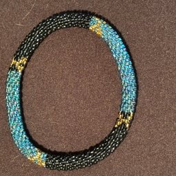 Hand Beaded Bracelet - Black, Gold, And Iridescent Aqua