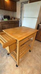 Wooden Kitchen Island Cart With A Butcher Block Top