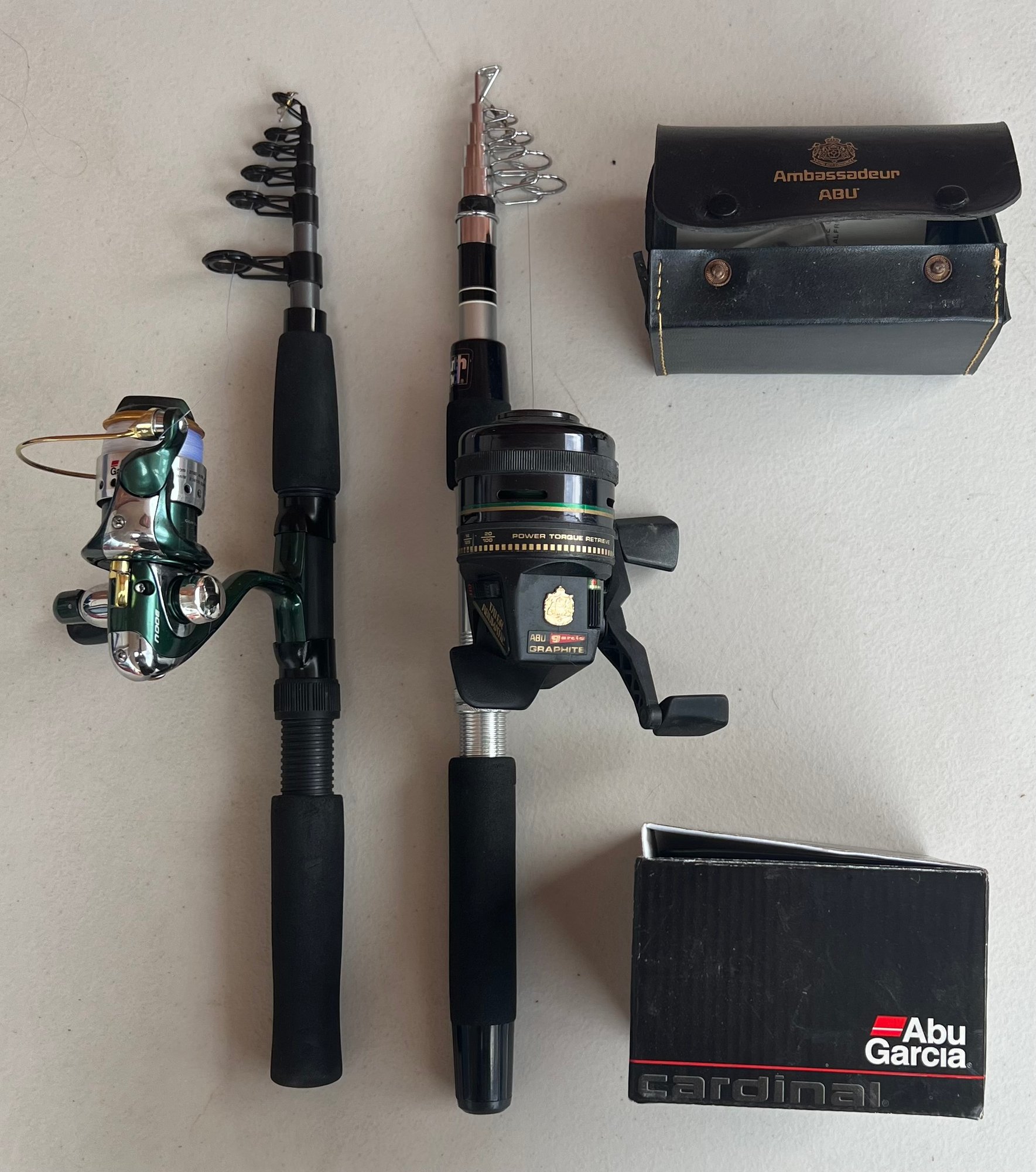 2) 6.5 Foot Fishing Rods With Abu Garcia Reels - Cardinal 300U And Abumatic  170GR #34395 | Auctionninja.com