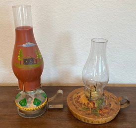 (2) Unique Painted Hand Held Oil Lamps - 1 With Metal Base
