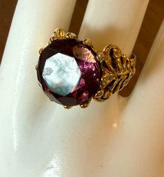 Vintage Gold Tone Sizable Ring With Large Purple Faceted Glass