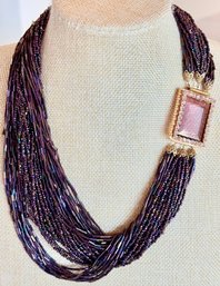 Torsade Peacock Carnival Seed Bead & Tube Bead Multi Strand 20 Inch Necklace With Purple Glass Stone Closure