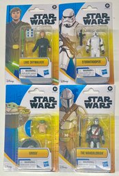 (4) Hasbro Star Wars Figurines - Luke Skywalker, Grogu, Stormtrooper, And The Mandalorian