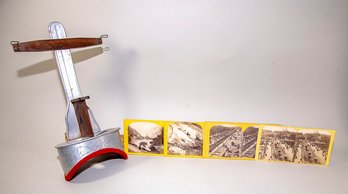ANTIQUE METAL STEREOSCOPE WITH FOUR 3D STEREOGRAPH CARDS