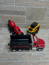 Lot Of 3 Toy Construction Vehicles  CAT Skid Steer, Speedway Dump Truck, Cement Mixer