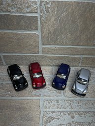 Lot Of 4 Chrysler PT Cruiser Diecast Cars 1:34 Scale  Saico  Assorted Colors