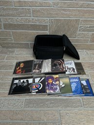 Lot Of 13 Music CDs W/ Carrying Case - Eagles Fleetwood Mac Hendrix Ray Charles & More