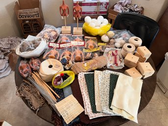 Box Full Of Doll Parts And Fabric