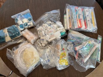 Box Full Of Toothbrushes And Floss