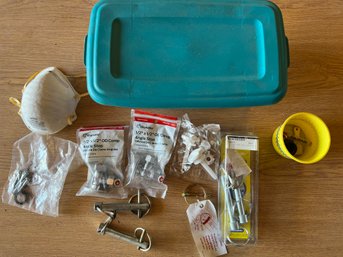 Plastic Tote Of Valves And Self Restraining Pins