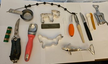Lot 7-73 Kitchen Lot Carafe, Dolphin Opener, Peelers, Scoop, Etc. (TIR-2)
