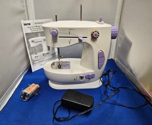 Lot 5-376 White's Sewing Machine (White Shelf 2)