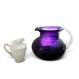 VIOLET AND WHITE GLASS PICHER AND CREAMER