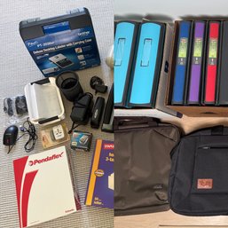 Assorted Binders For Paperwork And Two Laptop Bags