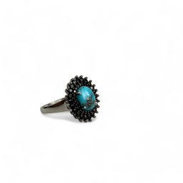 Sterling Silver Turquoise Faceted Stone Ring Surrounded By Onyx