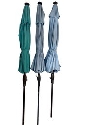 Three Outdoor Umbrellas With Stands