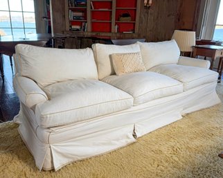 SLIP COVERED ROLL ARM DOWNFILL SOFA