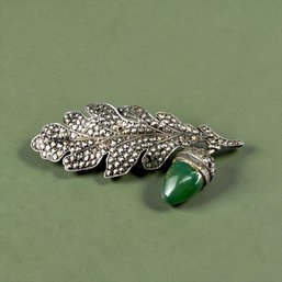 Elegant Leaf And Acorn-Form Sterling Silver Brooch Set With Jade And Marcasite