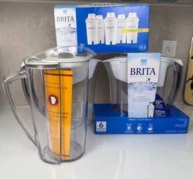Brita Filter System With 2 Pitchers And And A 3rd Pitcher