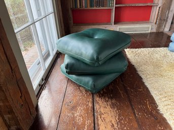 GREEN VINYL PILLOW OTTOMAN ON CASTORS