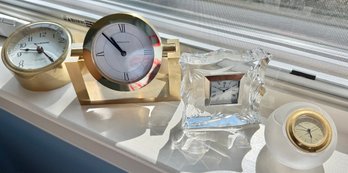 Four Desk Or Table Top Clocks, Tiffany & Co., Waterford, Sasaki, And Brookstone