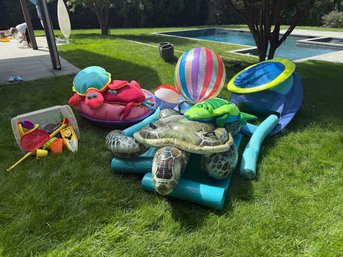 Large Assortment Of Colorful Pool Floats
