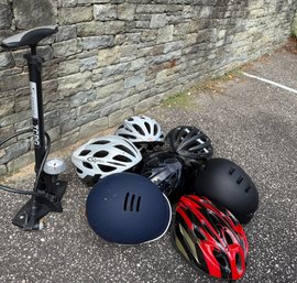 Seven Bicycle Helmets And Tire Pump