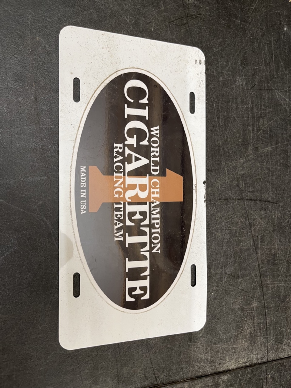 Cigarette World Champion Racing Team License Plate #9031