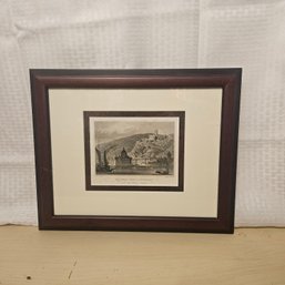 Framed Artwork: Town Across A Lake
