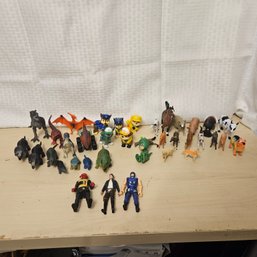 Large Boys’ Toy Lot: Action Figures, Dinosaurs & More