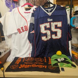 Sports & Novelty Apparel Lot – Patriots Jersey, Red Sox Vest, Cartoon Hat & Jägermeister Cloth