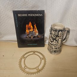 Eclectic Collectibles Lot – Gear, Bizarre Phenomena Book & Stein
