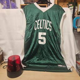 Sports & Decor Lot – Celtics Jersey & Red Spinning Light