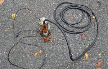 Sump Pump With Attached Hose