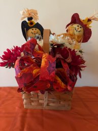 Happy Scarecrows In A Basket