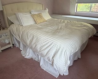 Cream Upholstered Wingback Bed With Tufted Arched Headboard, White Bedding & Decorative Pillows