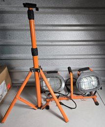 HDX Pair Of Corded Work Lights With Cages And Orange Tripod Stand