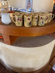 Lot Of 16 Ceramic Fruit Motif Mugs With Creamer Pitcher