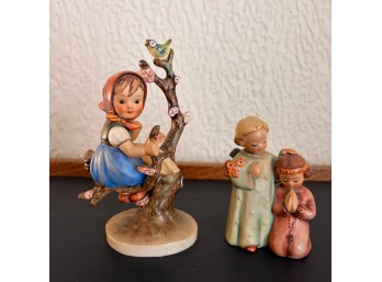 Goebel M.I. Hummel Figurines 'Apple Tree Girl' And 'Little Guardian' (LR)