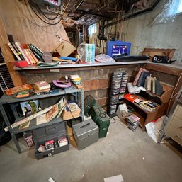 Basement Picker's Lot Including Vintage Books, CDs, Maps, Laser Level Kit, And More (Basement 2)