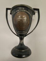 Small 1908 Coat Of Arms Track Meet Trophy