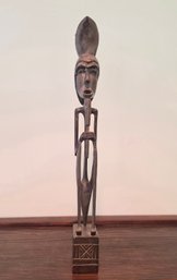 Senufo-style Wood Carving Featuring An Elongated Figure